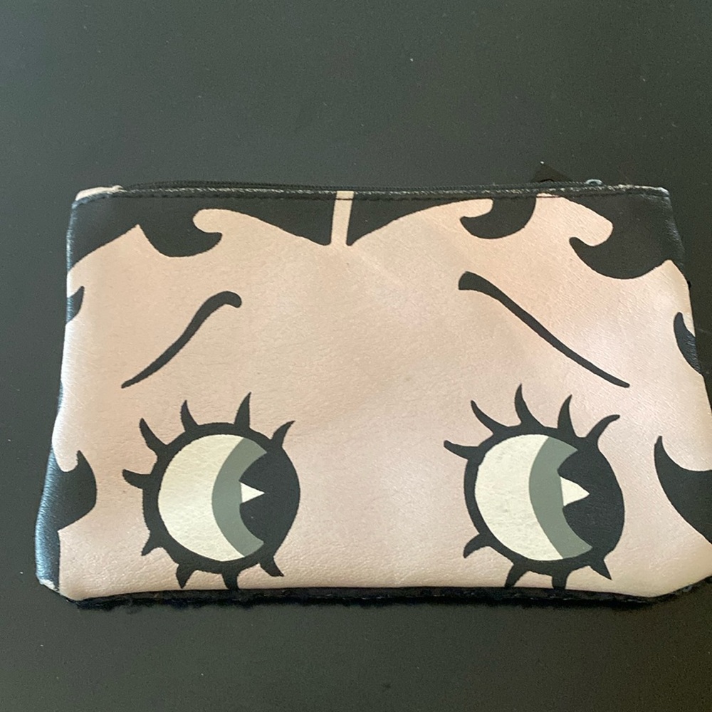Betty Boop makeup bag. Zipper at top and the back is sequins.